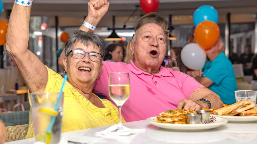 Elderly Couple cheering