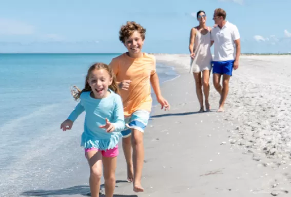 A family enjoying time on the beach