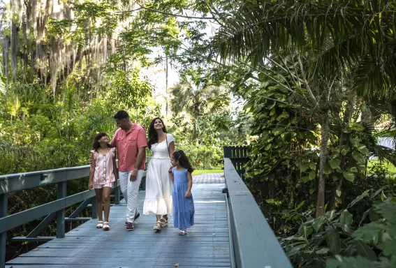 Family walking on boardwalk in Bonita Springs